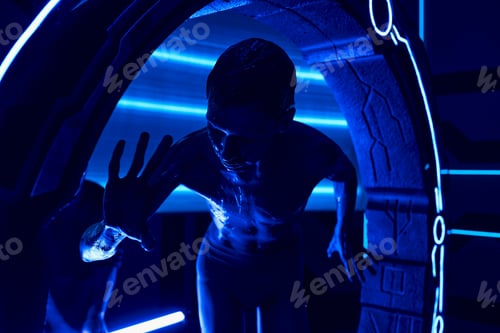Preview: cosmic phenomenon, extraterrestrial humanoid near experimental equipment in neon-lit science center