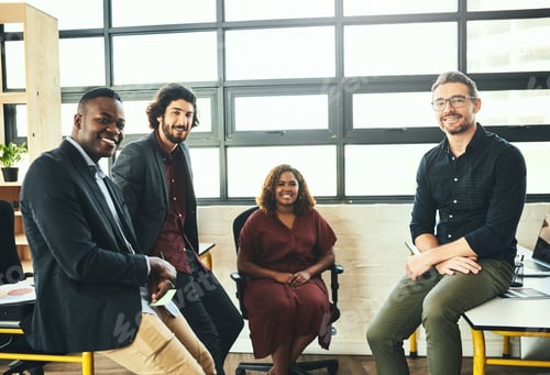 Preview: Smiling Business Colleagues Gather in Sunny Office