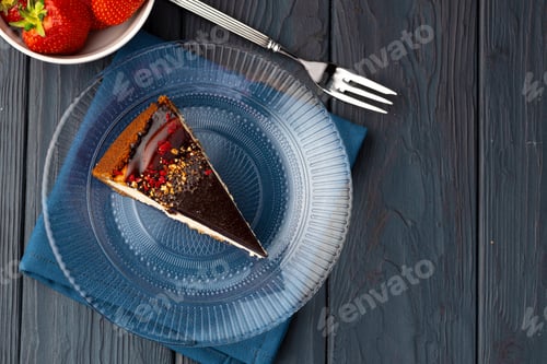 Preview: Vanilla cheesecake with chocolate top and berries