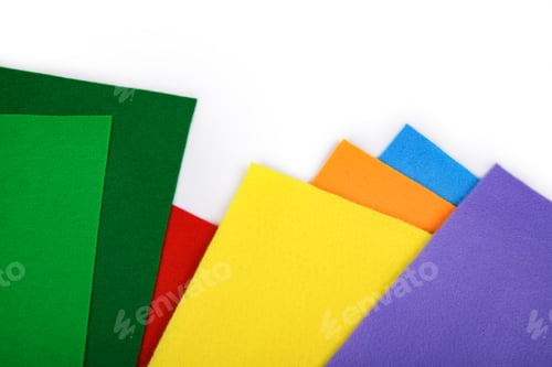 Preview: Colorful felt sheet samples in rainbow colors on a white background. Ideal for use in crafts, DIY.