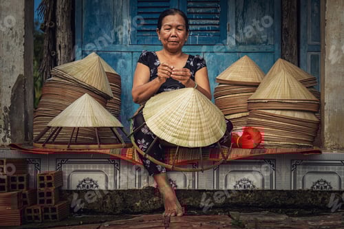 Preview: Vietnamese Old woman craftsman making the traditional vietnam
