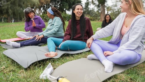 Preview: Multiracial women chatting after yoga class outdoor at city park - Healthy lifestyle and sport