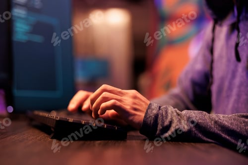 Preview: Hacker typing on keyboard, writing code