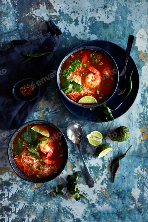 Preview: Two bowls of spicy noodle soup ready to be enjoyed