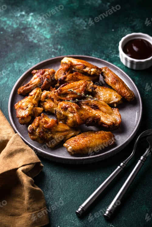 Preview: Baked roasted chicken wings with sauce