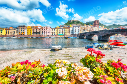 Preview: Attractive cityscape of Bosa town with Ponte Vecchio bridge across the Temo river.