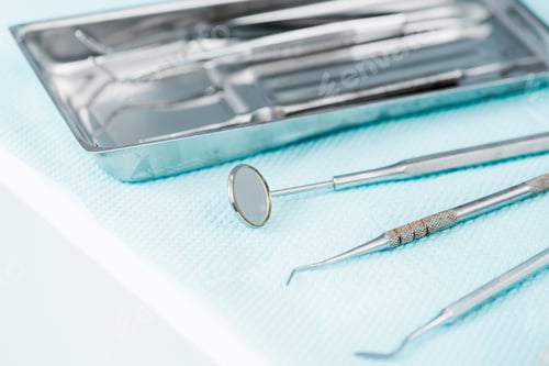 Preview: close up of metallic medical instruments in dental clinic