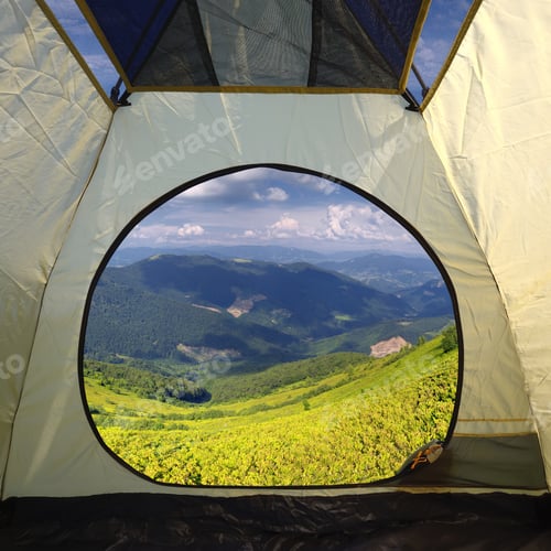 Preview: View from inside a tent on mountains landscape