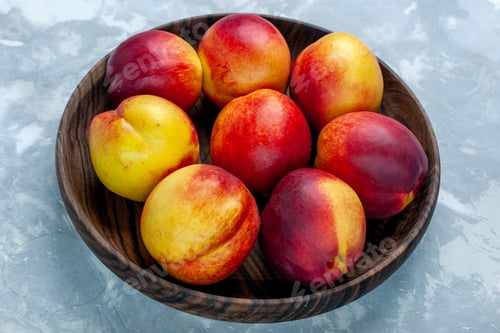 Preview: front close view fresh peaches mellow and tasty fruits inside brown plate on light-white desk fresh