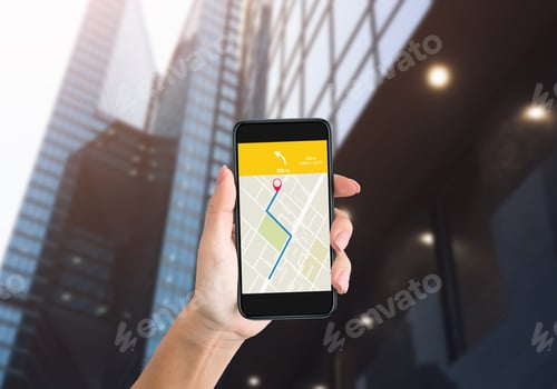Preview: Female Hand Holding Phone With GPS Navigator Application Outdoors