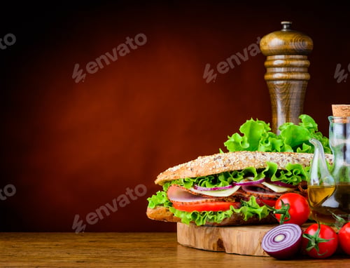 Preview: Sandwich with Fresh Vegetables on a Wooden Board