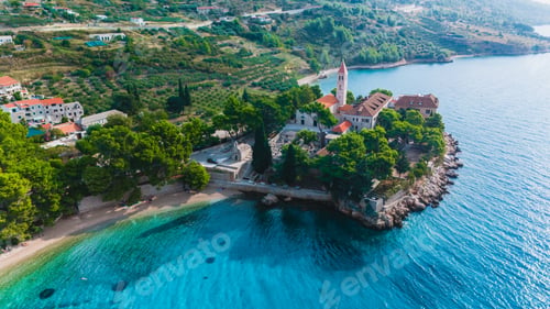 Preview: Explore the stunning coastline of Brac Island in Croatia with lush greenery and crystal-clear waters