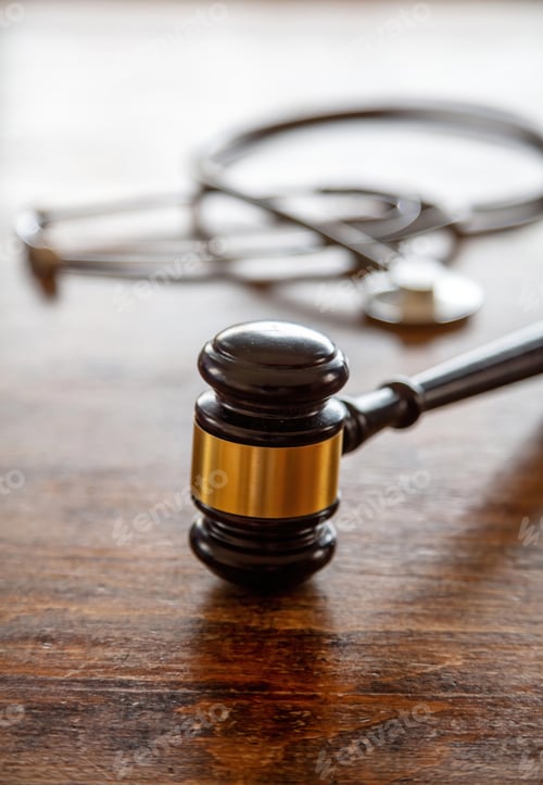 Preview: Healthcare Law. Medical stethoscope and judge gavel on lawyer office desk