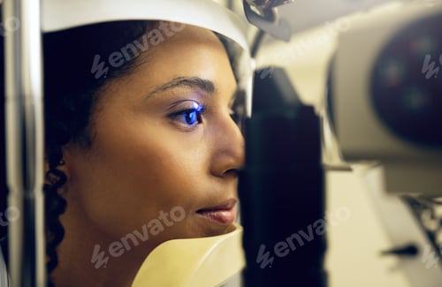 Preview: Woman, eye test and opthalmology at clinic for vision, cataract and optic health with slit lamp exa