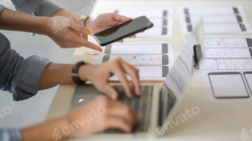 App Design Discussion Using Laptop and Smartphone