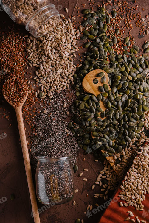 Preview: Different types of grains and seeds on shabby wooden
