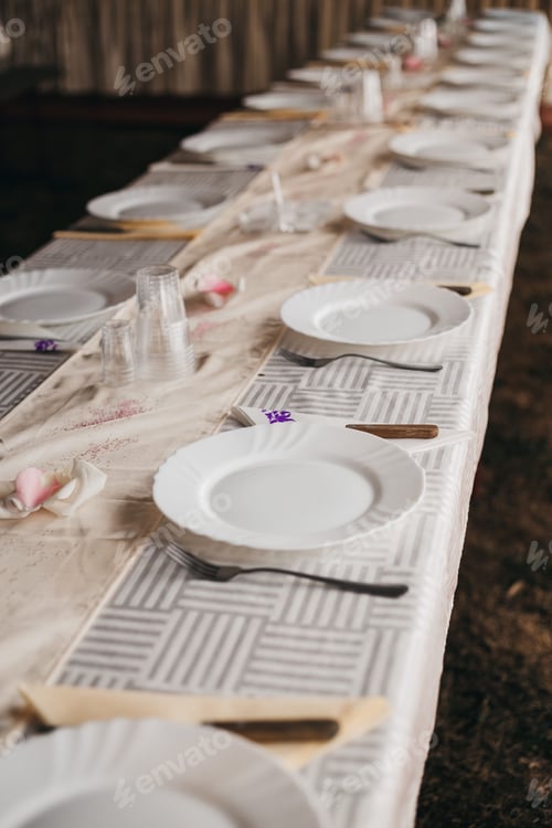 Preview: Vertical shot of table setting at a wedding venue