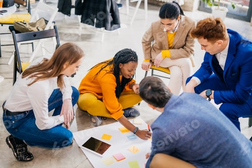 Preview: Business team working in a start-up office