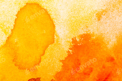 Preview: top view of yellow and orange watercolor spills with copy space