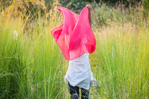 Preview: Beautiful young girl outdoor enjoying nature. young girl in meadow.