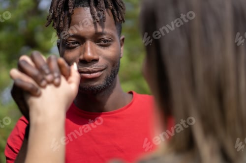 Preview: Interracial Couple Holding Hands