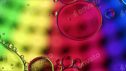 Preview: Abstract Colorful Food Oil Drops Bubbles and spheres Flowing on Water Surface