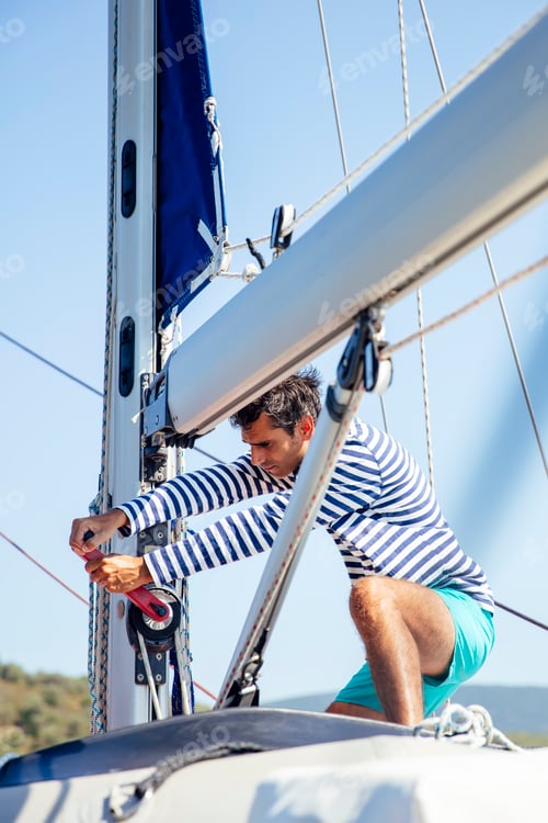 Preview: Young man on a sailboat