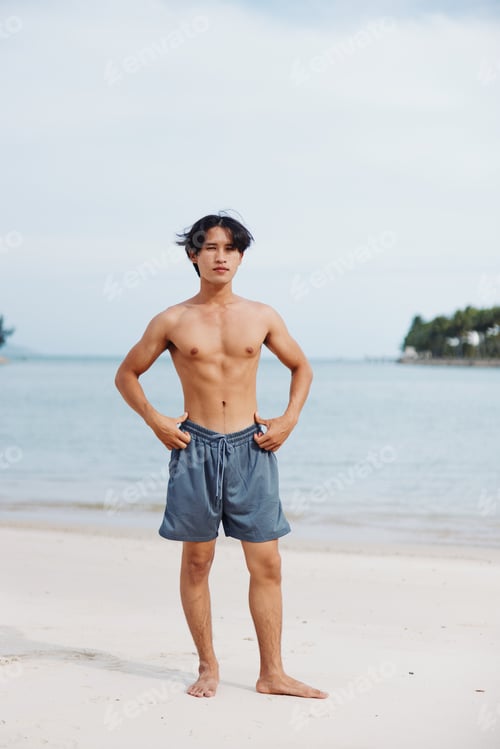 Preview: Active Asian Athlete Experiencing Freedom and Power of Beach Running