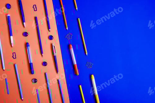 Preview: Stationery on orange, blue. Bright flat lay.