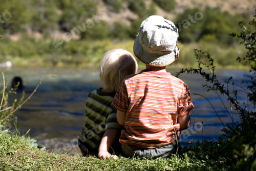 Preview: Brothers sitting by the lake