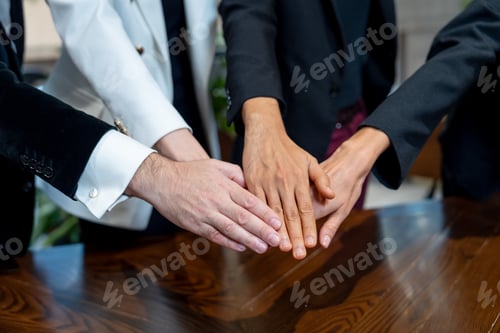 Preview: Close up join hands of business people in concept of cooperation to get the success of work.