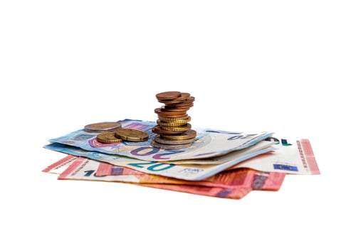 Preview: micro loan offer, European Union money, metal coins and paper banknotes closeup on white background