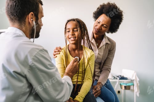 Preview: Pediatrician examining a little african girl at hospital. Healthcare, people concept