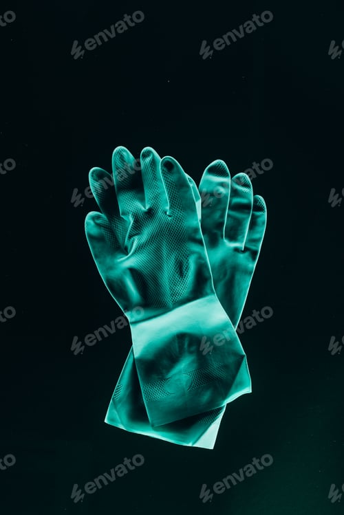 Preview: top view of protective rubber turquoise gloves isolated on black