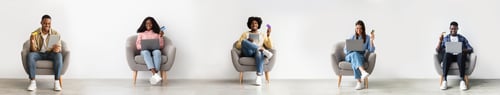 Preview: Multiethnic Buyers With Computers Using Credit Cards Shopping At Home