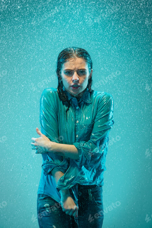 Preview: The Portrait Of Young Beautiful Woman In The Rain