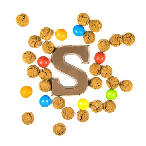 Preview: Chocolate letter S with bunch of scattered pepernoten cookies