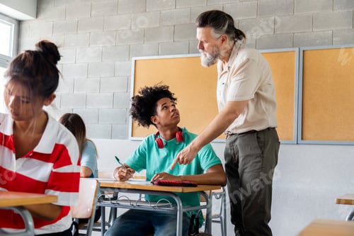 Preview: African american high school student ask for help with homework to mature male teacher.