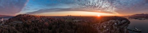 Preview: Aerial Panoramic View of a modern city during a colorful and cloudy sunset