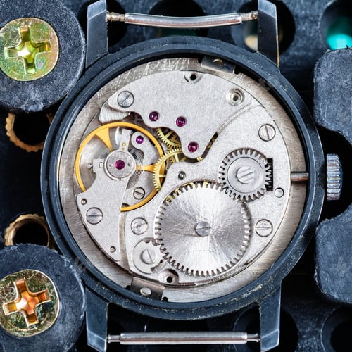 Preview: old watch fixed in plastic holder for repairing