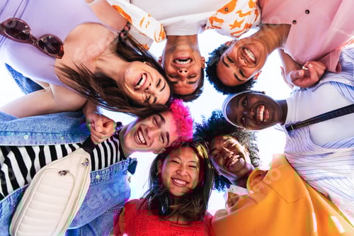 Preview: Multiethnic group of young happy friends hanging out