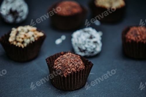 Preview: Sweets. Round candies. Chocolate candies. Sweets in coconut. Candies in nut crumbs.