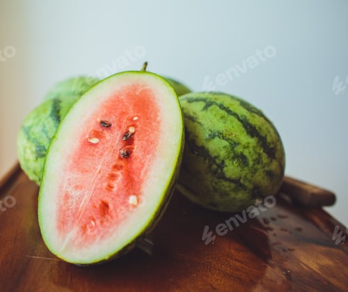 Preview: Small watermelon on a wooden board