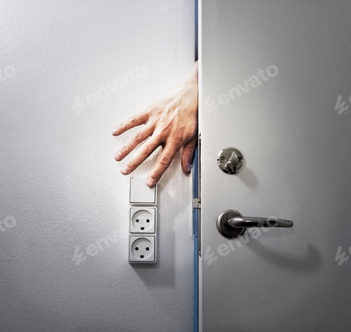 Preview: Hand turning off light from behind door