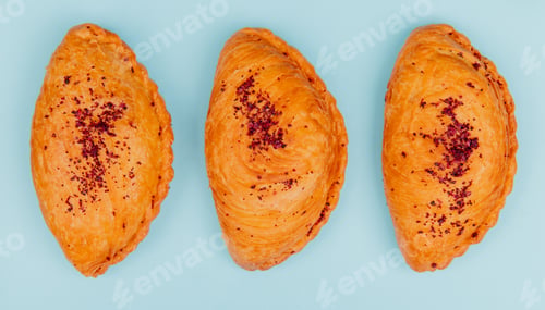 Preview: horizontal view of badamburas on blue background