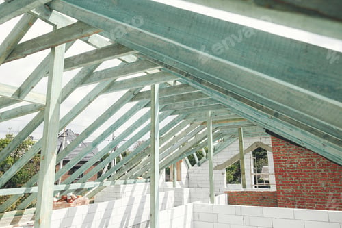 Preview: Unfinished roof trusses, view in attic with rafters, beams, windows and chimney