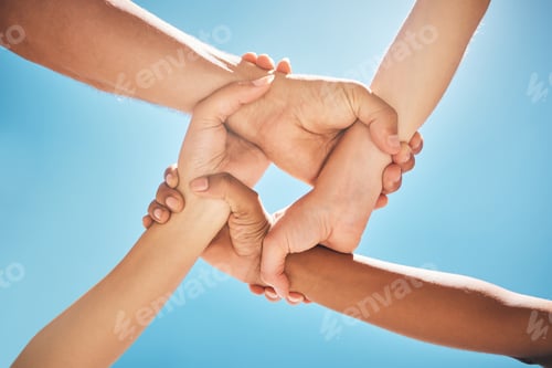 Preview: Support, community and diversity with hands of people against blue sky for freedom, teamwork and ju