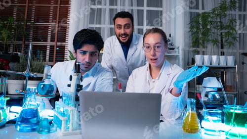 Preview: A group of young scientists are conducting experiments in the lab using a microscope.