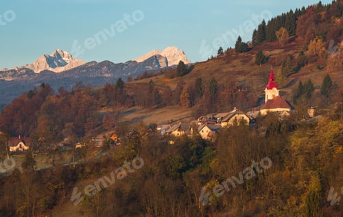 Preview: Village and mountains at sunrise