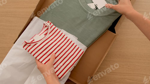Preview: Unpacking a parcel of clothes